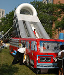 Fire Truck Inflatable Slide from Oliver Entertainment and Caterting serving Northern Virginia, Washington DC and Maryland